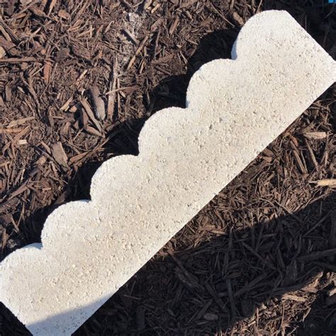 A quick way to create order and organization around your lawn and garden, concrete edgers will enhance your greenery while simplifying mowing and trimming chores. . 24 inch scalloped concrete edging